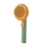 Self-cleaning brush for cats and dogs
